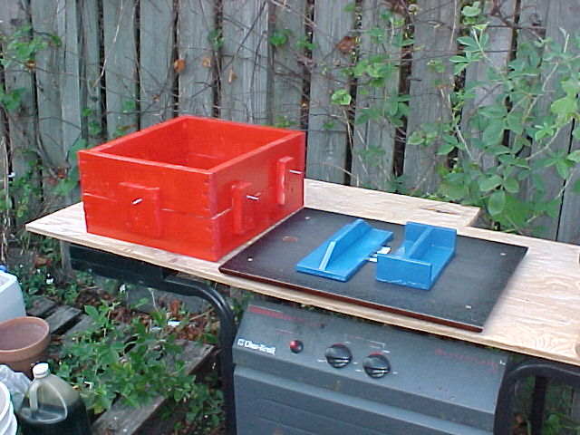 painted flask and painted pattern on the sand work table.jpg
